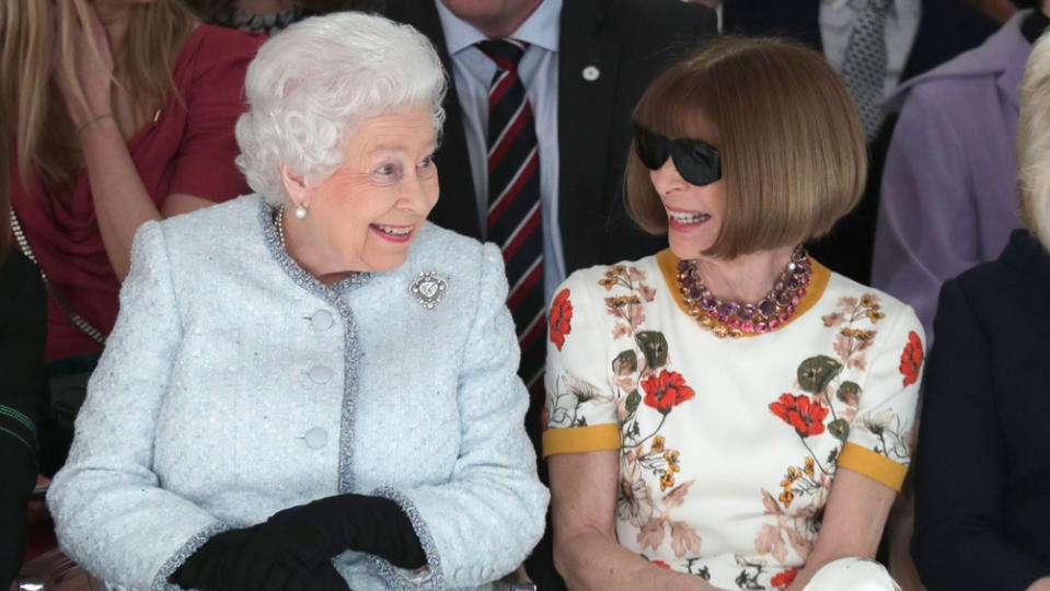 Sitting with Anna Wintour at London Fashion Week - Credit: Yui Mok - Pool/Getty Images