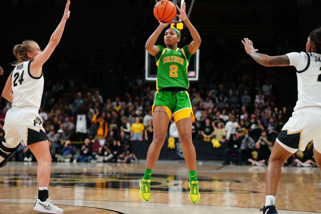 Oregon Ducks guard Chance Gray (2) shoots the ball over Colorado Buffaloes guard Maddie Nolan (24) in the second quarter at CU Events Center Feb. 9, 2024, in Boulder, Colorado.