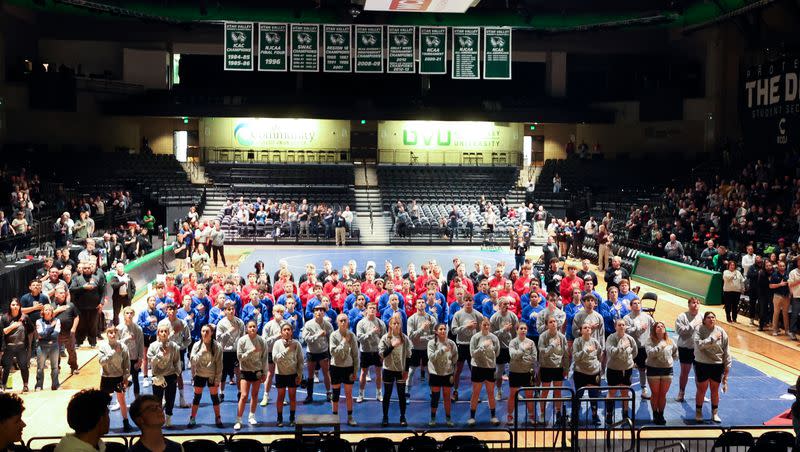 Wrestlers listen to “The Star-Spangled Banner” before competing in the Ross Brunson Utah All-Star Dual at the UCCU Events Center in Orem, on Tuesday, Jan. 9, 2024.