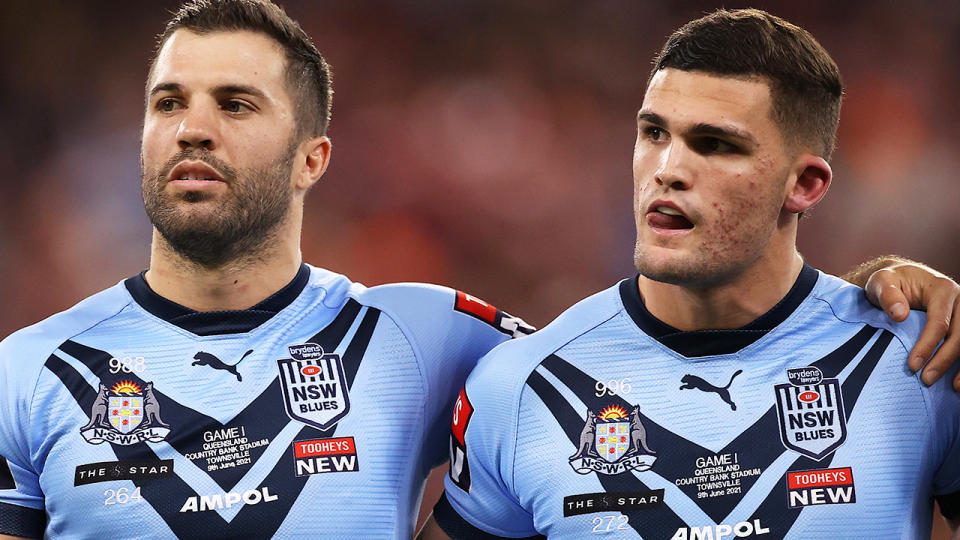 NSW Blues players James Tedesco and Nathan Cleary watch the national anthem before State of Origin I.