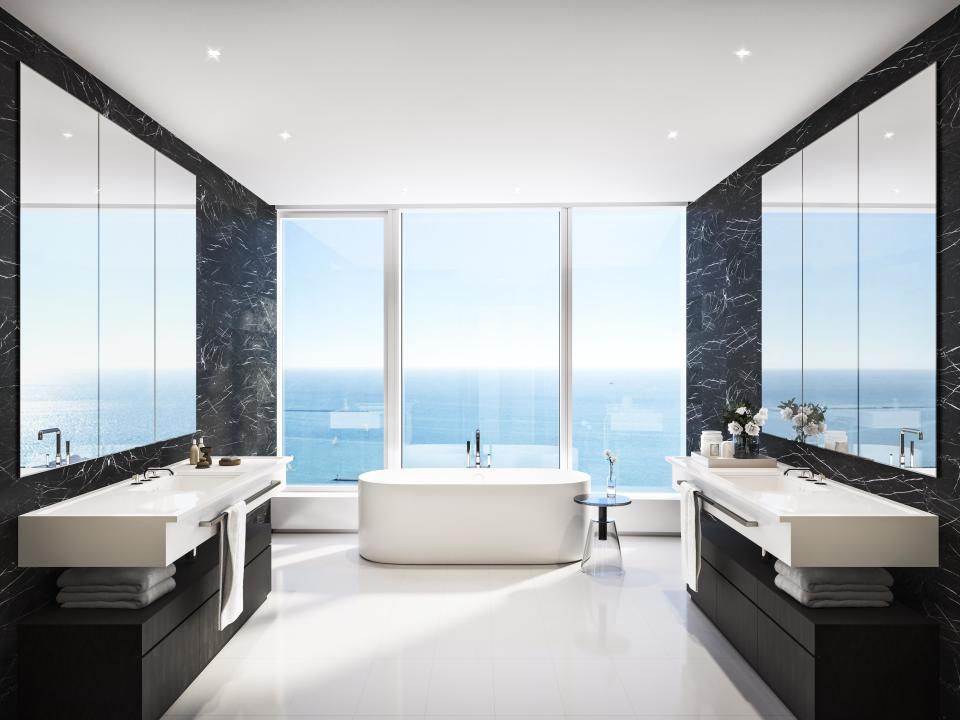 In the bath, Mann will make the most of the floor-to-ceiling windows by installing a luxe soaking tub.