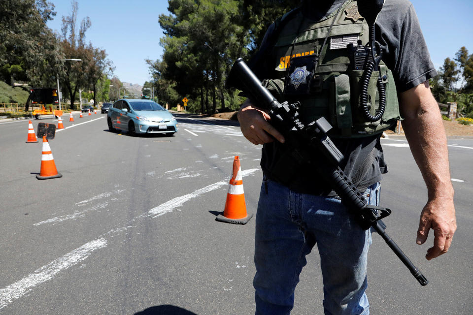 A San Diego County Sheriffís Deputy secures the scene of a shooting incident at the Congregation Chabad synagogue in Poway, north of San Diego, April 27, 2019. (Photo: John Gastaldo/Reuters)