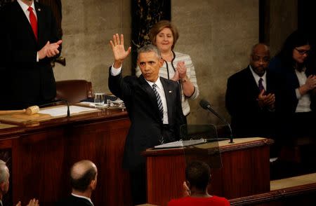 U.S. President Barack Obama waves goodbye at the conclusion of his final State of the Union address to a joint session of Congress in Washington, January 12, 2016. REUTERS/Kevin Lamarque