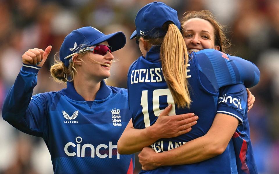 Kate Cross of England celebrates the wicket of Beth Mooney of Australia with team-mate Sophie Ecclestone - England beat Australia in final ODI to draw Women&#x002019;s Ashes series