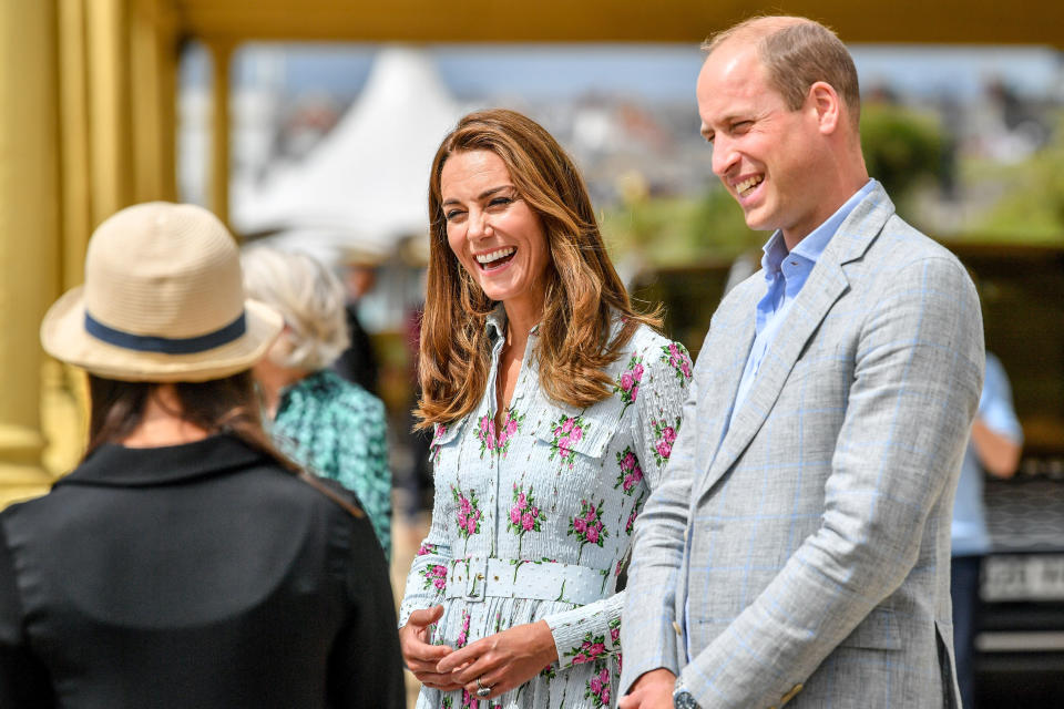 The Cambridges on the promenade as they visit beach huts to speak to local business owners about the impact of COVID-19 on the tourism sector on Aug. 5. (Photo: WPA Pool via Getty Images)