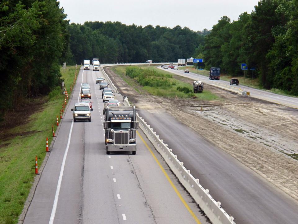 Traffic moves along a section of Interstate 26 southwest of Columbia, S.C. The state had the highest rate of traffic deaths per vehicle mile traveled in 2021, but many counties there did not apply for federal Safe Streets for All money to make roads safer.