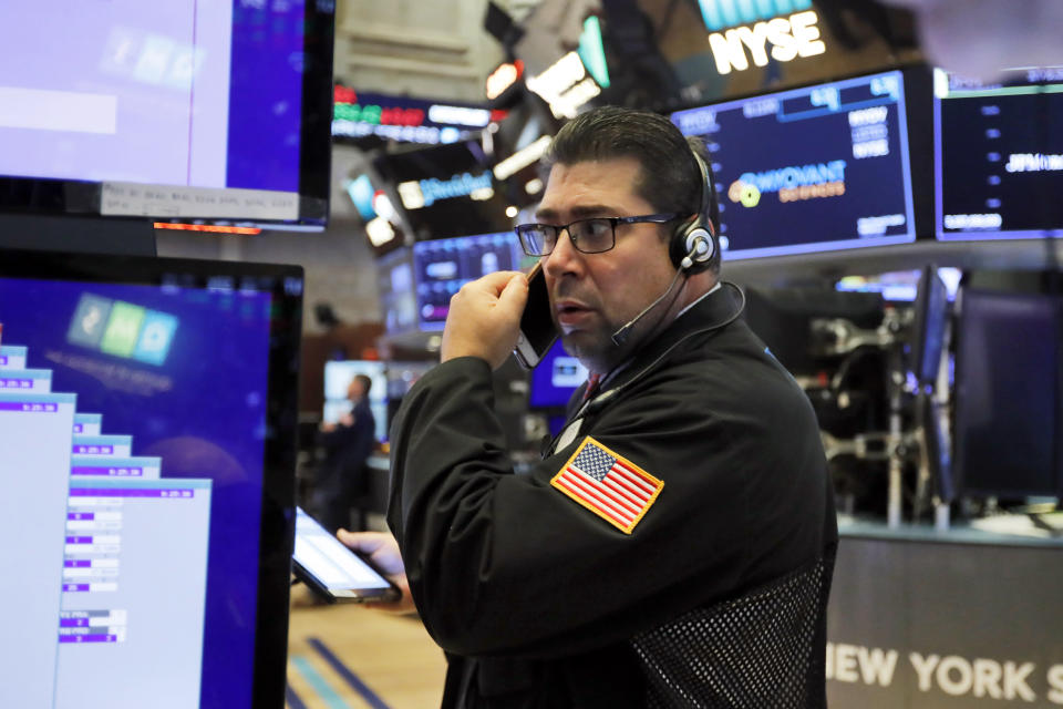 Trader Michael Capolino works on the floor of the New York Stock Exchange, Wednesday, Sept. 4, 2019. Stocks are opening higher on Wall Street following big gains in Asia as Hong Kong's government withdrew a controversial extradition law that set off three months of protests there. (AP Photo/Richard Drew)