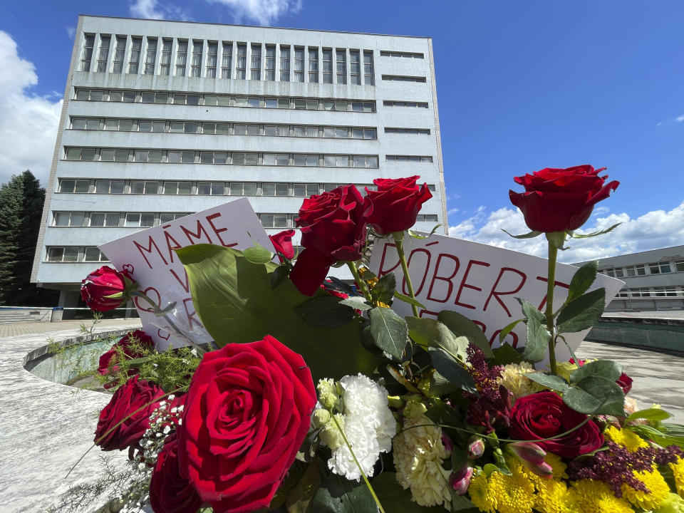 Flowers are placed outside the F. D. Roosevelt University Hospital, where Slovak Prime Minister Robert Fico, who was shot and injured, is being treated, in Banska Bystrica, central Slovakia, Saturday, May 18, 2024. The man accused of attempting to assassinate Slovak Prime Minister Robert Fico made his first court appearance Saturday as the nation's leader remained in serious condition recovering from surgery after surviving multiple gunshots, Slovak state media said. (AP Photo/Lefteris Pitarakis)