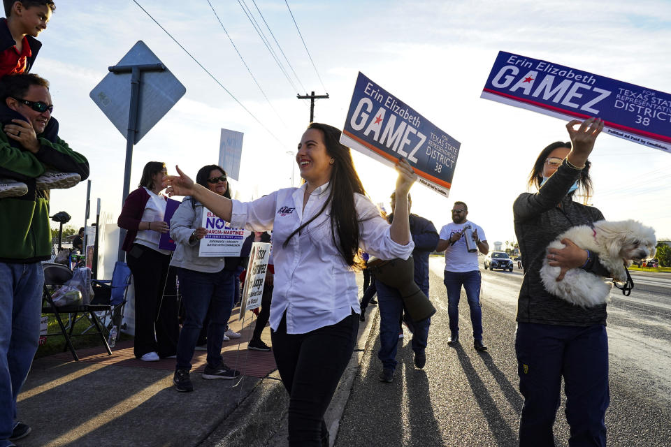 Texas State Representative for District 38 Democratic candidate Erin Elizabeth Gamez is pictured Tuesday, March 1, 2022, campaigning on election day for the 2022 Democratic Primary Election outside the polling location at Burns Elementary in Brownsville, Texas. (Denise Cathey/The Brownsville Herald via AP)