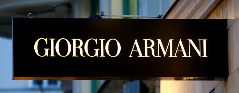 A company logo is pictured outside a Giorgio Armani store in Vienna