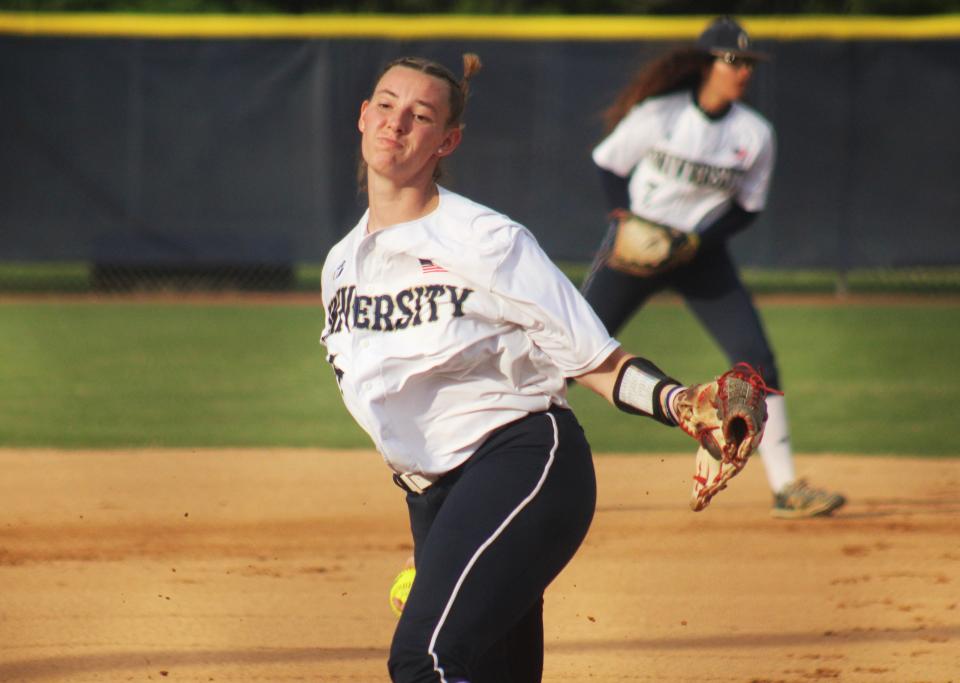 University Christian's Sophia Kardatzke delivers a warm-up pitch before a high school softball game against West Nassau on April 2, 2024. [Clayton Freeman/Florida Times-Union]