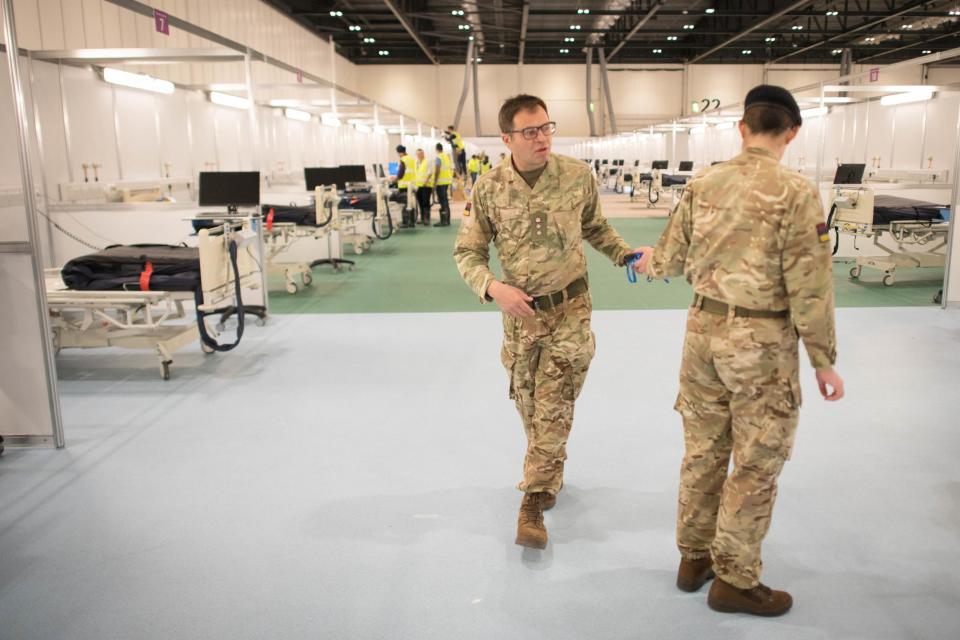 Military personnel have been working 15-hour shifts to transform the convention centre into a hospital for coronavirus patients (PA)