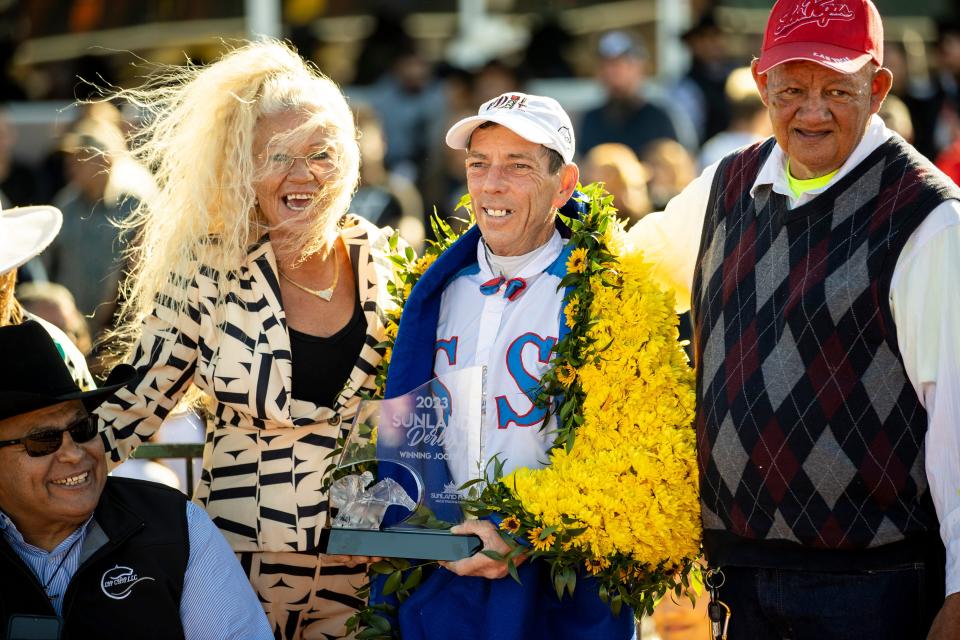 Jockey Ken S. Tohill smiles with family after winning the 18th running of the Sunland Derby riding â€œWild on Iceâ€, #7, (not pictured) at Sunland Park Racetrack & Casino in Sunland Park, New Mexico, Sunday, March 26, 2023. The trainer is Joel H. Marr and the owner is Frank Sumpter Sr.