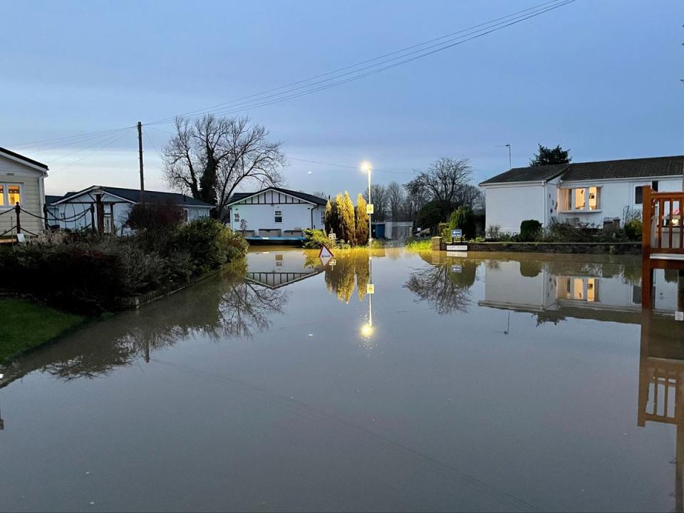 Floodwater surrounds houses in Summer Way, Radcliffe-on-Trent, Nottinghamshire (PA)