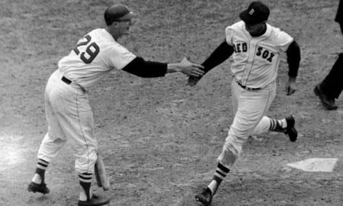 Ted Williams crosses home plate during his final season with the Red Sox in 1960. He was the last MLB player to hit .400 over a full season