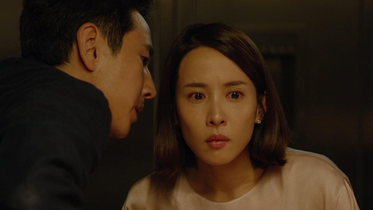 Lee Sun-kyun and Cho Yeo-jeong star in "Parasite." (Photo: Neon)