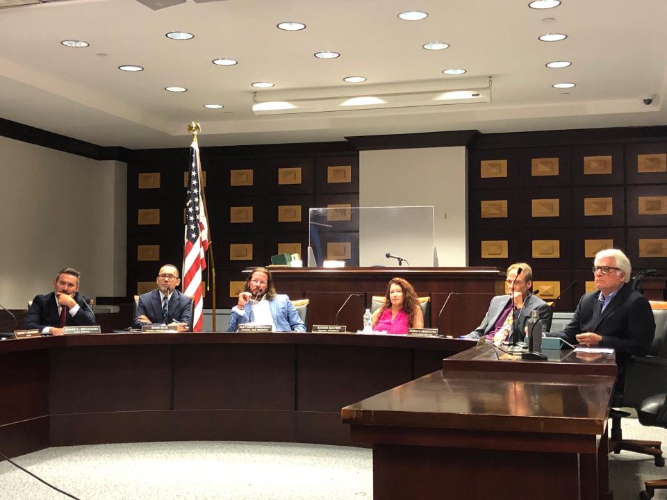 The Morristown Council listens to remarks from George Enslin, owner of Enslin's LLC/G&S Car Service, during a public hearing in which the council voted to revoke his company's license Tuesday, Sept. 12, 2023.