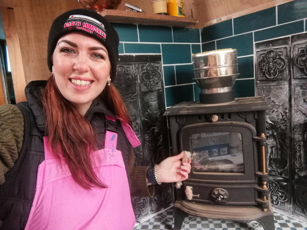 One of Earle's favourite features is her log burner. (Caters)
