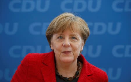 German Chancellor and leader of the Christian Democratic Union (CDU) Angela Merkel, attends a party board meeting in Berlin, Germany March 14, 2016, the day after election in three states - the industrial state of Baden-Wuerttemberg, the wine-growing region of Rhineland-Palatinate and the eastern state of Saxony-Anhalt. REUTERS/Fabrizio Bensch