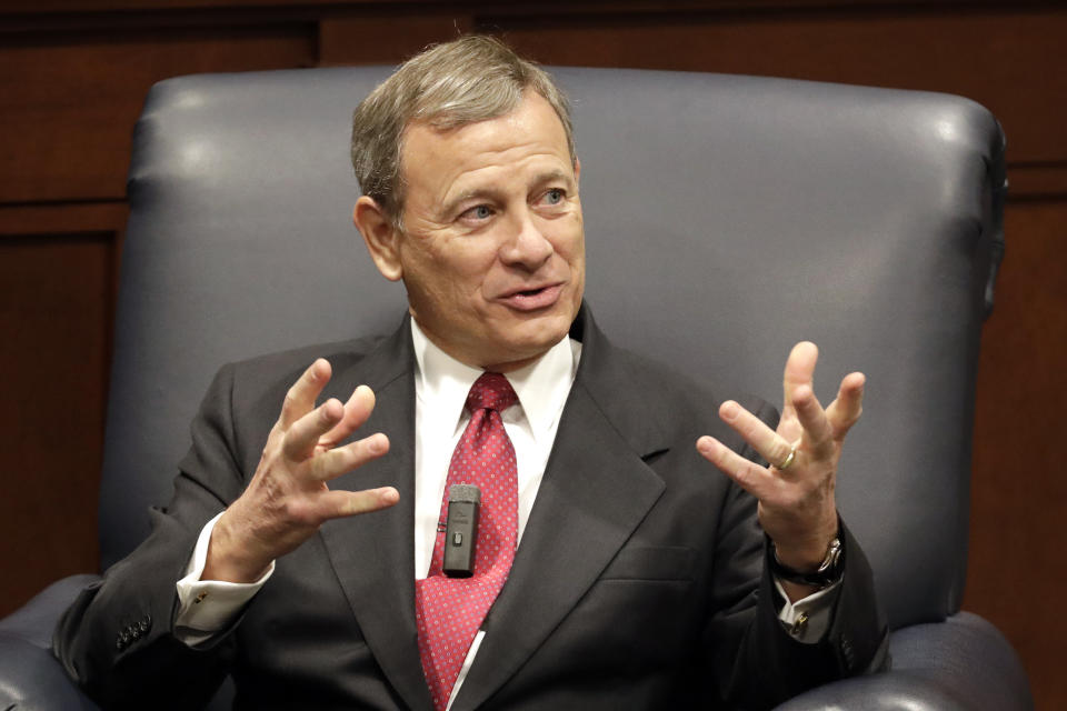 FILE - In this Feb. 6, 2019 file photo, Supreme Court Chief Justice John Roberts answers questions during an appearance at Belmont University in Nashville, Tenn. How a Senate impeachment trial of President Donald Trump would unfold is not yet known, but among the issues senators will have to decide are how long it lasts and whether witnesses are called. Presiding over the trial will be Chief Justice John Roberts, who theoretically could issue key rulings on some of these questions. (AP Photo/Mark Humphrey)