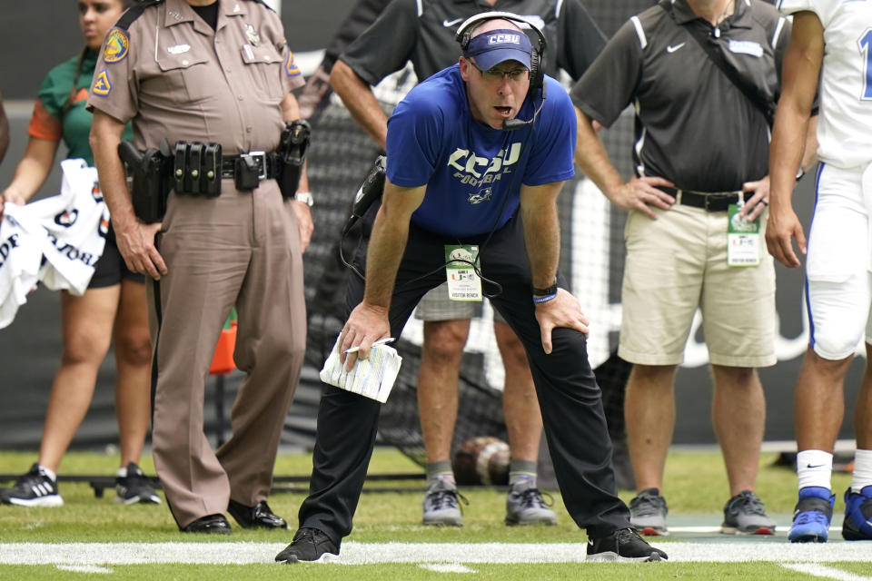 Central Connecticut State head coach Ryan McCarthy watches during the first half of an NCAA college football game against Miami, Saturday, Sept. 25, 2021, in Miami Gardens, Fla. (AP Photo/Lynne Sladky)