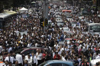 <p>People evacuated from office buildings gather in Reforma Avenue after an earthquake in Mexico City, Tuesday Sept. 19, 2017. A powerful earthquake jolted central Mexico on Tuesday, causing buildings to sway sickeningly in the capital on the anniversary of a 1985 quake that did major damage.(AP Photo/Rebecca Blackwell) </p>