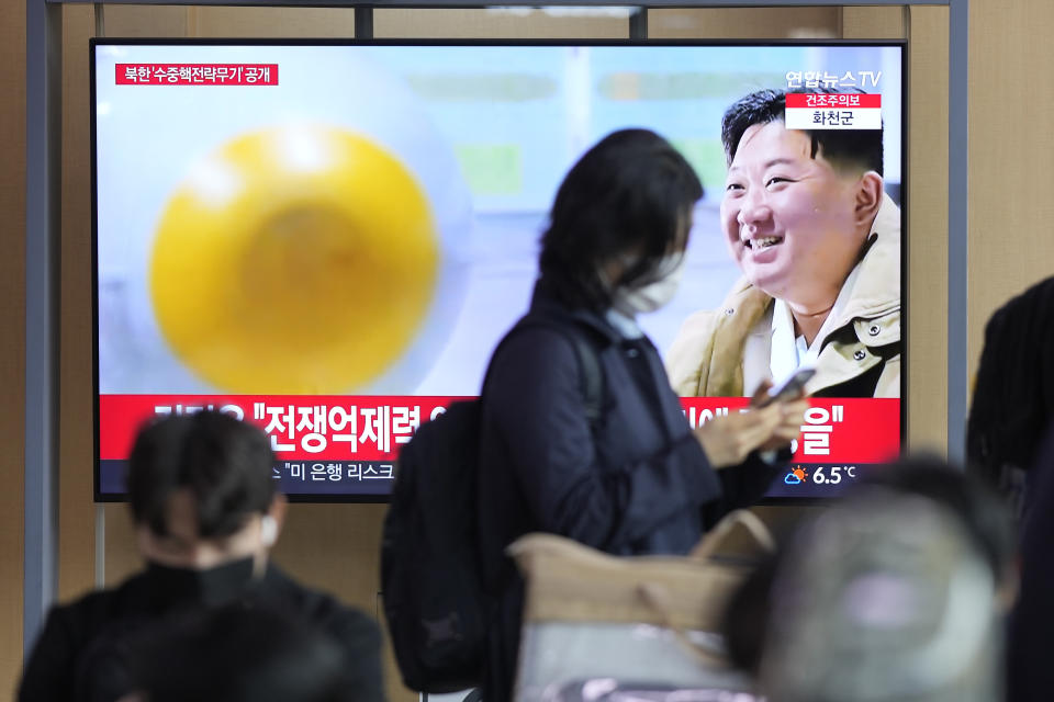 A TV screen shows an image of North Korean leader Kim Jong Un during a news program at the Seoul Railway Station in Seoul, South Korea, Friday, March 24, 2023. North Korea said Friday its latest cruise missile launches this week were part of nuclear attack simulations that also involved a test of a purported underwater attack drone as leader Kim Jong Un vowed to make his rivals “plunge into despair.” (AP Photo/Lee Jin-man)