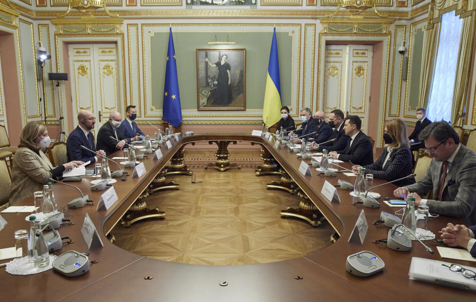 In this photo provided by the Ukrainian Presidential Press Office, Ukrainian President Volodymyr Zelenskiy, center right, and European Council President Charles Michel during their meeting in Kyiv, Ukraine, Wednesday, March 3, 2021. (Ukrainian Presidential Press Office via AP)