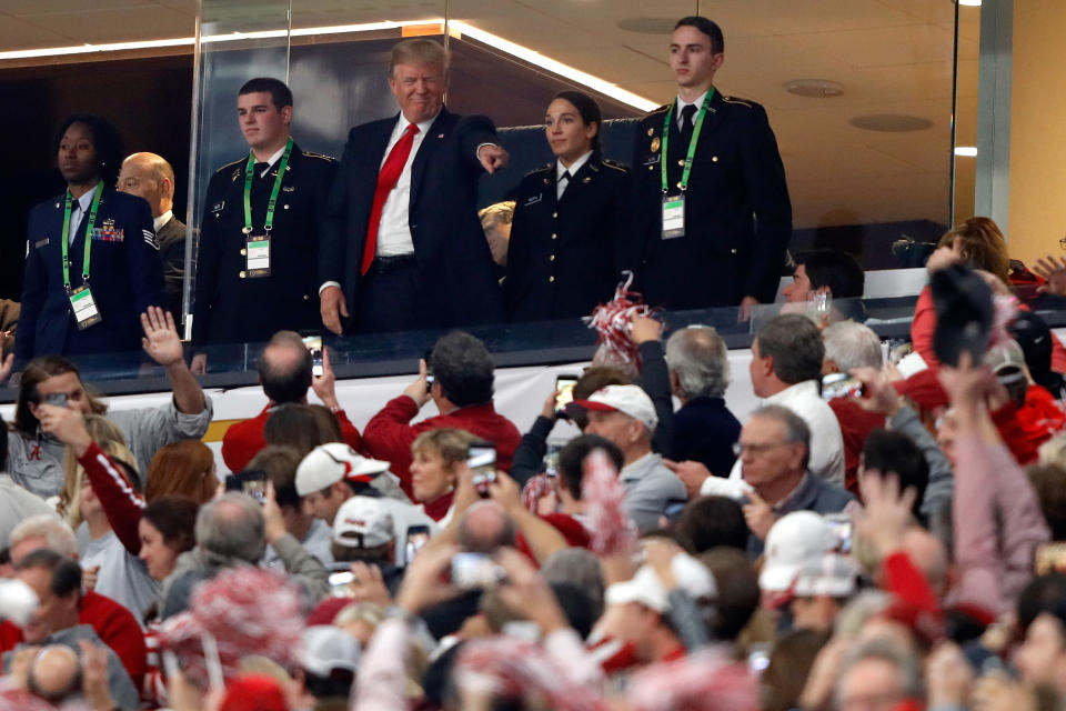 <p>U.S. President Donald Trump points to fans prior to the CFP National Championship presented by AT&T between the Georgia Bulldogs and the Alabama Crimson Tide at Mercedes-Benz Stadium on January 8, 2018 in Atlanta, Georgia. (Photo by Jamie Squire/Getty Images) </p>