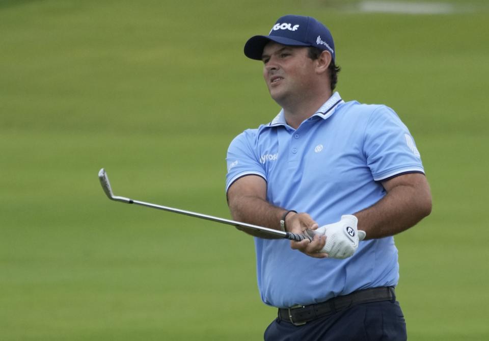 Patrick Reed of The United States plays his second shot on the 8th hole during the first round of the Dubai Desert Classic, in Dubai, United Arab Emirates, Thursday, Jan. 26, 2023. (AP Photo/Kamran Jebreili)