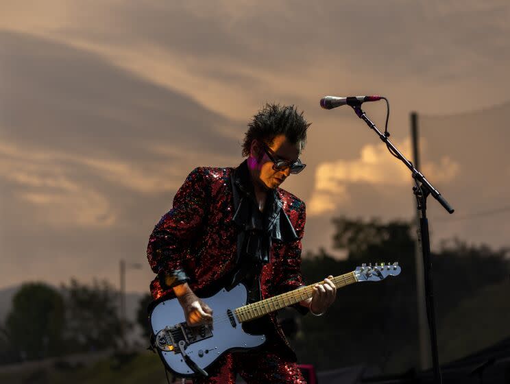 Pasadena, CA - May 20: Love And Rockets singer and guitarist Daniel Ash performs at dusk on the Outsiders stage at Cruel World Festival at Brookside at the Rose Bowl, on Saturday, May 20, 2023. (Allen J. Schaben / Los Angeles Times)