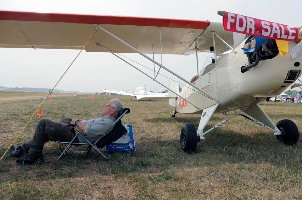 Pete McClough escapes the heat while relaxing in the shade of his Pieten Pol during  EAA AirVenture Oshkosh 2023 on Monday, July 24, 2023 in Oshkosh, Wis. Wm. Glasheen USA TODAY NETWORK-Wisconsin
