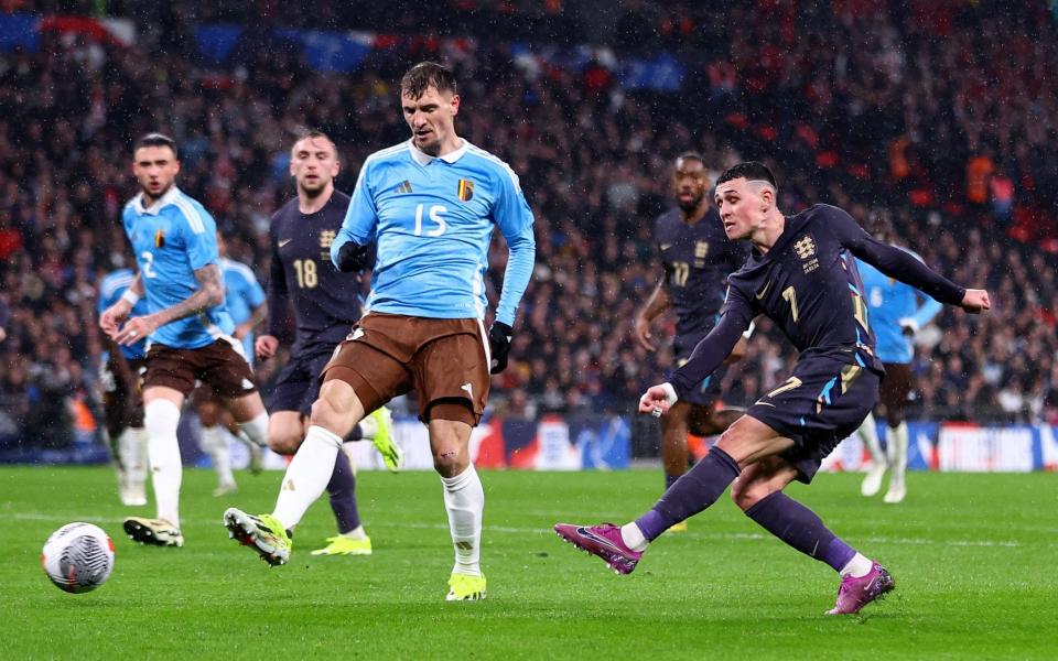 England's Phil Foden shoots at goal