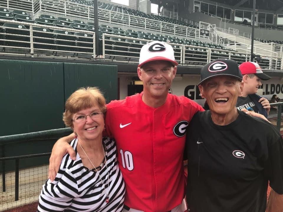 Georgia baseball coach Scott Stricklin, center, with his mother Brenda Stricklin and father Dave "Strick" Stricklin at Foley Field in the spring of 2019.