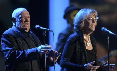 British singer Joe Cocker performs with Jennifer Warnes (R) after receiving the trophy for Category ' lifetime achievement award music' during the 48th Golden Camera award ceremony in Berlin, February 2, 2013. REUTERS/Maurizio Gambarini/Pool