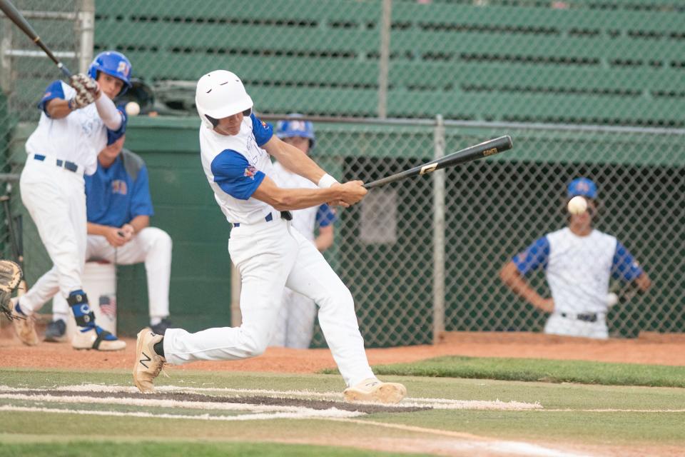 Pueblo Azteca's Andrew Plutt connects with a pitch during a game against Greeley GoJo on the first day of the 42nd annual Andenucio Memorial Baseball Tournament on Thursday, June 16, 2022.