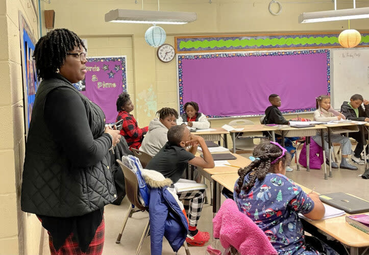 As the district’s director of school performance, Leondra Williams monitors whether teachers use approved materials and regularly review student test data. At Southwood Elementary, she visited a fifth grade math class. (Linda Jacobson/The 74) 