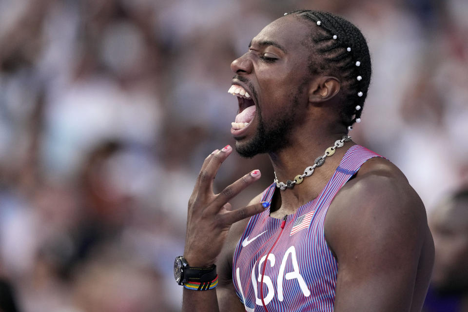 Noah Lyles wins a historically close Olympic 100meter sprint by five