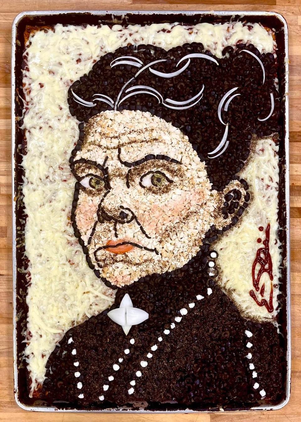 Pizza artist Eric Palmieri, of D. Palmieri's Bakery in Johnston, R.I., created a Lizzie Borden inspired pizza. The pie was not a special order but created for "art's sake," to be displayed on his Facebook page and the image sold as an NFT.