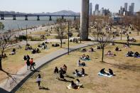 People enjoy a picnic at a Han River Park following the outbreak of the coronavirus disease (COVID-19), in Seoul