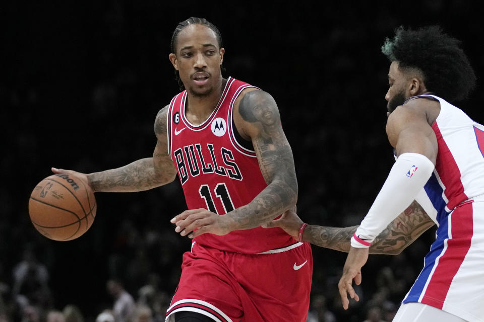 Detroit Pistons Saddiq Bey, right, guards Chicago Bulls DeMar DeRozan during the NBA basketball game between Chicago Bulls and Detroit Pistons at the Accor Arena in Paris, Thursday, Jan. 19, 2023. (AP Photo/Christophe Ena)