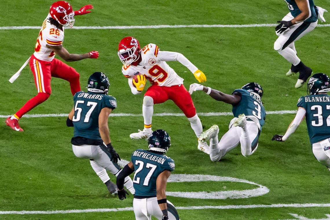 Kansas City Chiefs wide receiver Kadarius Toney (19) attempts to maneuver past Philadelphia Eagles defenders during Super Bowl LVII on Sunday, Feb. 12, 2023, in Glendale, Arizona.