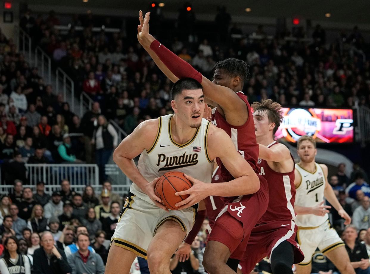 Purdue center Zach Edey (15) controls the ball against Alabama forward Mohamed Wague (11) during the second half at Coca-Cola Coliseum.