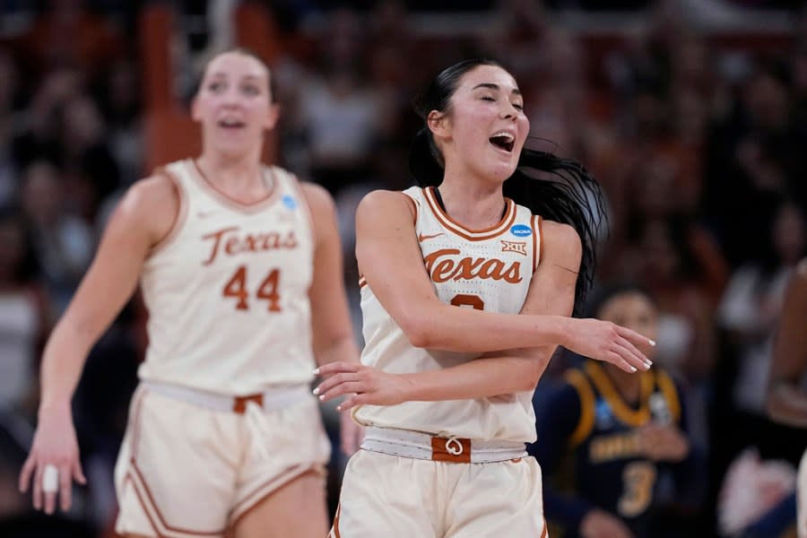 Texas guard Shaylee Gonzales, right, celebrates a score against Drexel during the second half of a first-round college basketball game in the women’s NCAA Tournament in Austin, Texas, Friday, March 22, 2024. (AP Photo/Eric Gay)