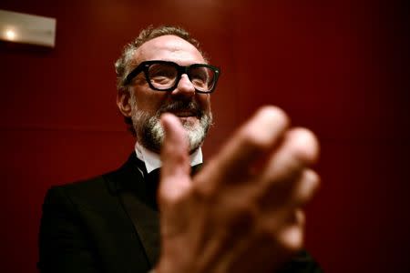 Massimo Bottura, the chef patron of Osteria Francescana restaurant in Italy, gestures after receiving the award for Best Restaurant during the World's 50 Best Restaurants Awards at the Palacio Euskalduna in Bilbao, Spain, June 19, 2018. REUTERS/Vincent West