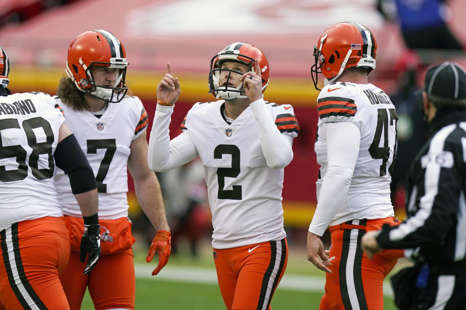 FILE - Cleveland Browns place kicker Cody Parkey (2) celebrates after kicking a 46-yard field goal during the first half of an NFL divisional round football game against the Kansas City Chiefs in Kansas City, in this Sunday, Jan. 17, 2021, file photo. Parkey agreed to re-sign with Cleveland on Friday, March 19, 2021, returning to the team after beginning last season on the practice squad.(AP Photo/Charlie Riedel, File)