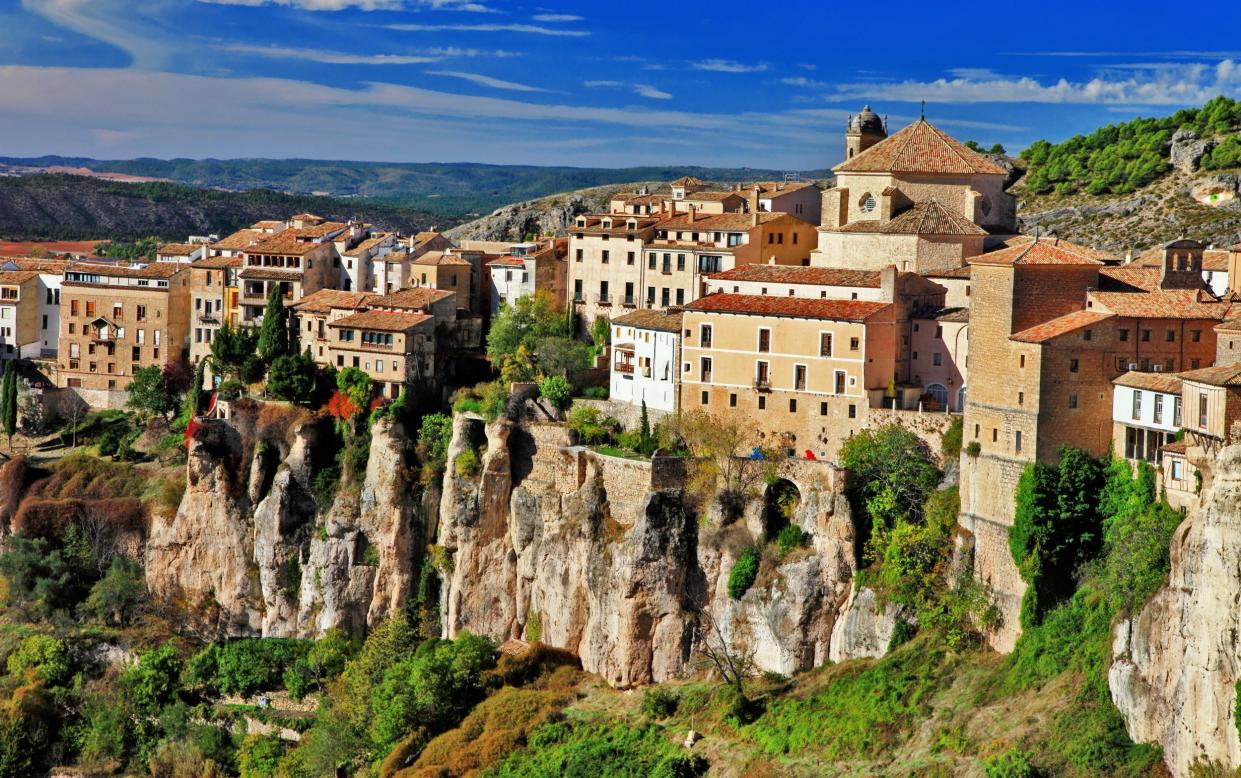 Properties standing on the rocks at Cuenca