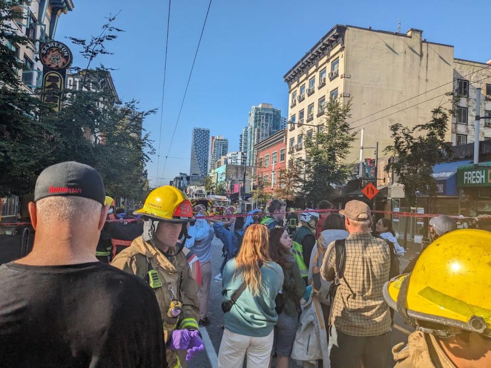 Dozens of people could be seen outside the hostel on Saturday morning. It is located in the Granville Entertainment District.