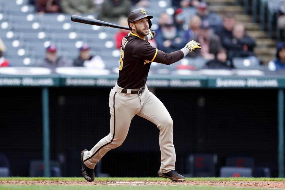San Diego Padres' Austin Nola hits an RBI double against the Cleveland Guardians during the sixth inning in the first baseball game of a doubleheader, Wednesday, May 4, 2022, in Cleveland. (AP Photo/Ron Schwane)