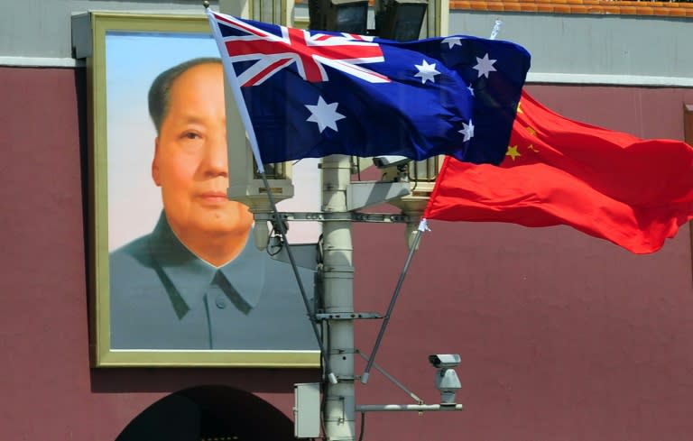 Bilateral ties between Australia and China have been strained by a suspended death sentence handed to a Chinese-Australian dissident writer (FREDERIC J. BROWN)